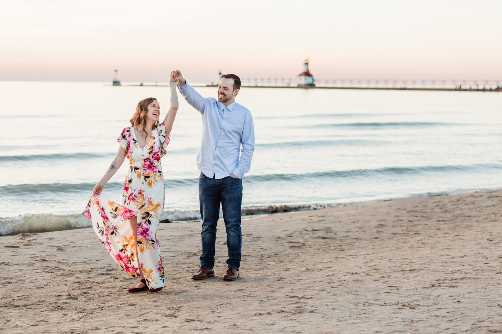 A couple dancing at their Silver Beach engagement session